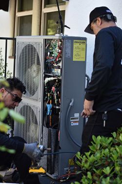 two hvac contractor los angeles workers installing mini split
