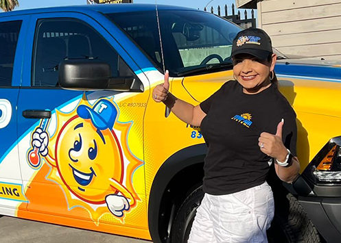 woman_in_front_of_company_truck